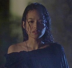 Lynn stands in the rain